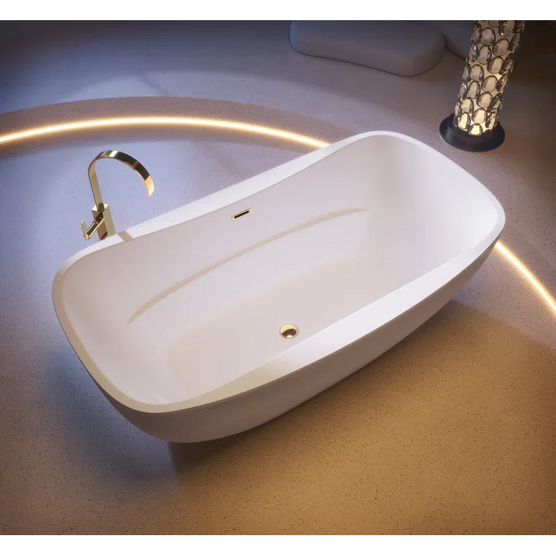 Modern white freestanding bathtub with gold faucet and ambient circular floor lighting in a stylish bathroom.
