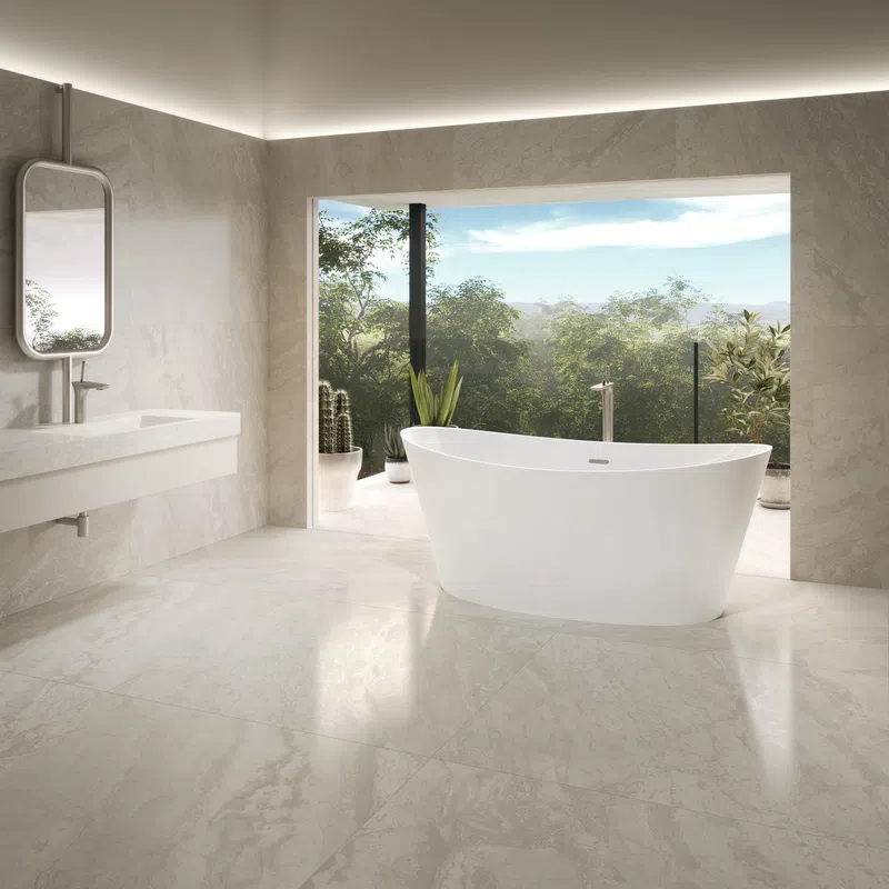 Modern bathroom with a freestanding white bathtub, large window showcasing greenery, and sleek sink with mirror.