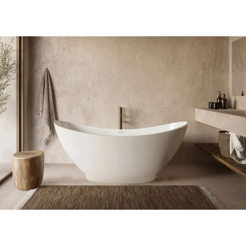 Modern freestanding white bathtub in minimalist bathroom with wooden stool, towel, and neutral-toned decor