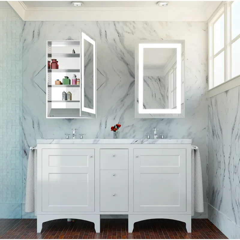 Modern bathroom with white marble walls, double sink vanity, lighted mirrors, and open medicine cabinet with toiletries.