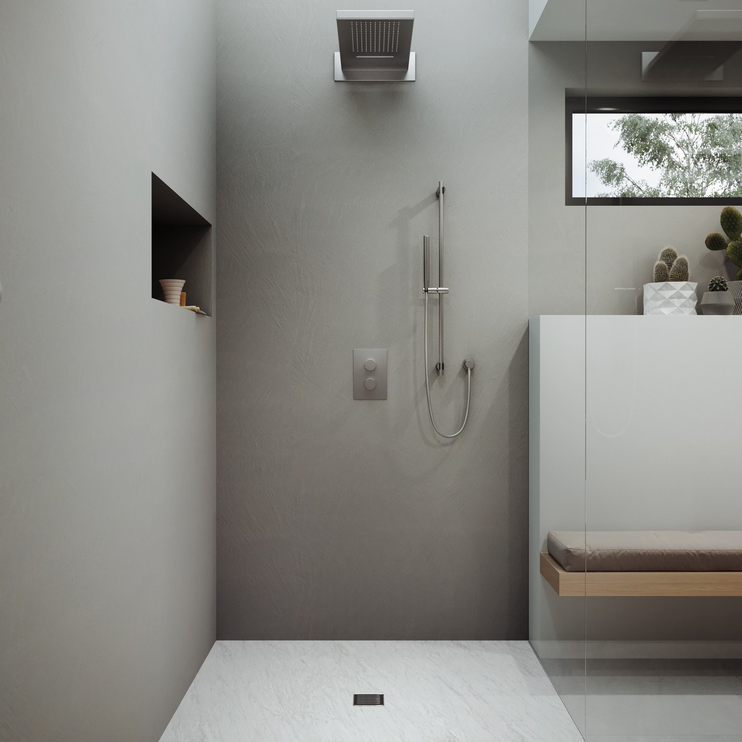 Minimalist modern gray shower with rain showerhead, handheld shower, built-in shelf, glass partition, and window with plants.