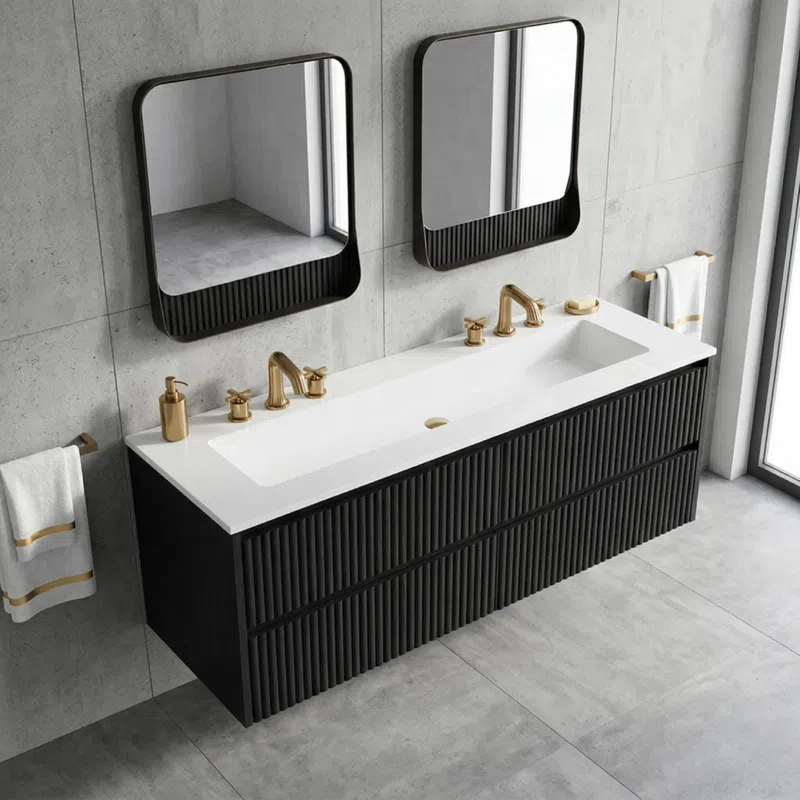 Modern black double vanity with white countertop, gold faucets, two square mirrors, and gold-accented towels in gray bathroom.