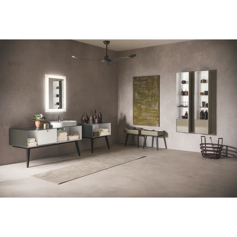Modern gray bathroom with floating cabinets, illuminated mirror, wall art, and minimalist decor in soft lighting
