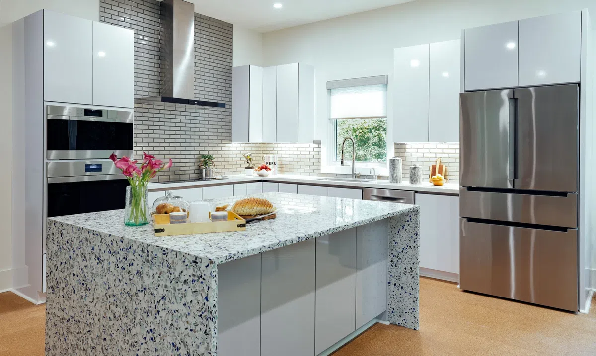 A kitchen with marble countertops
