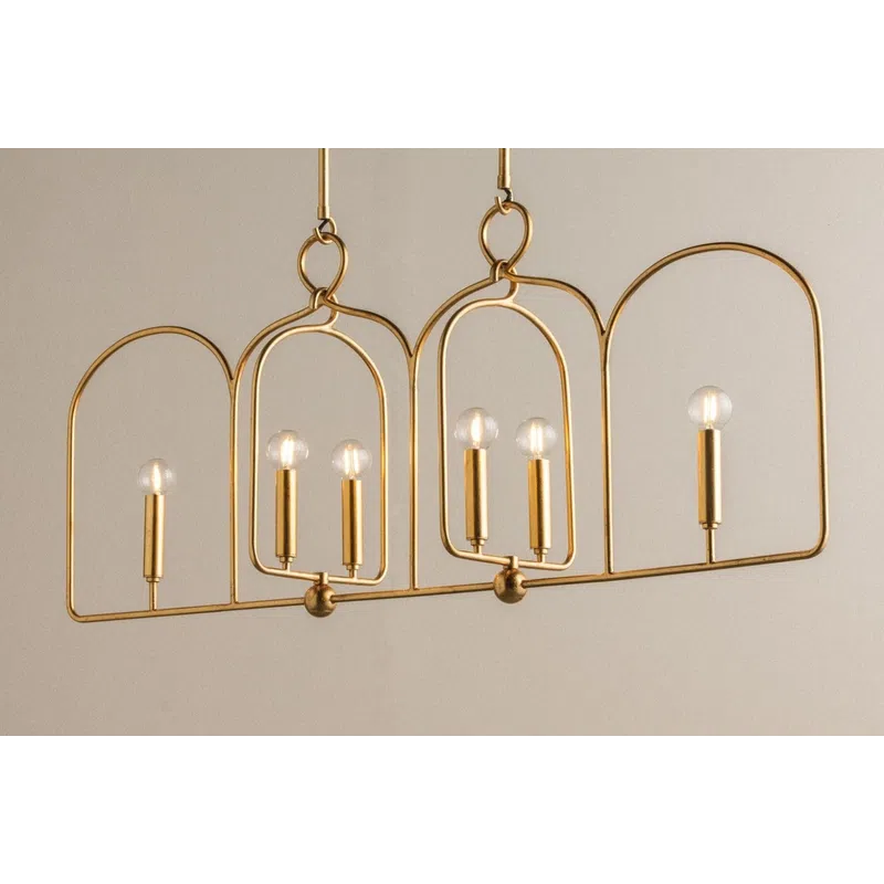 Modern gold metal pendant chandelier with six exposed bulb fixtures in geometric arch frame design.