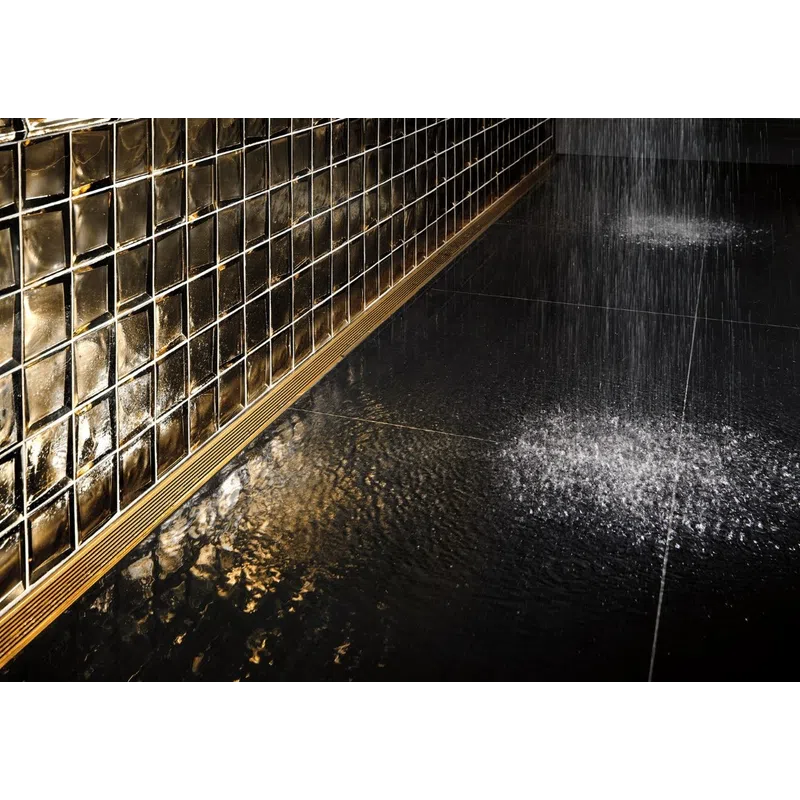 Modern shower with rain water flow, reflective black floor, and stylish golden mosaic tiled wall