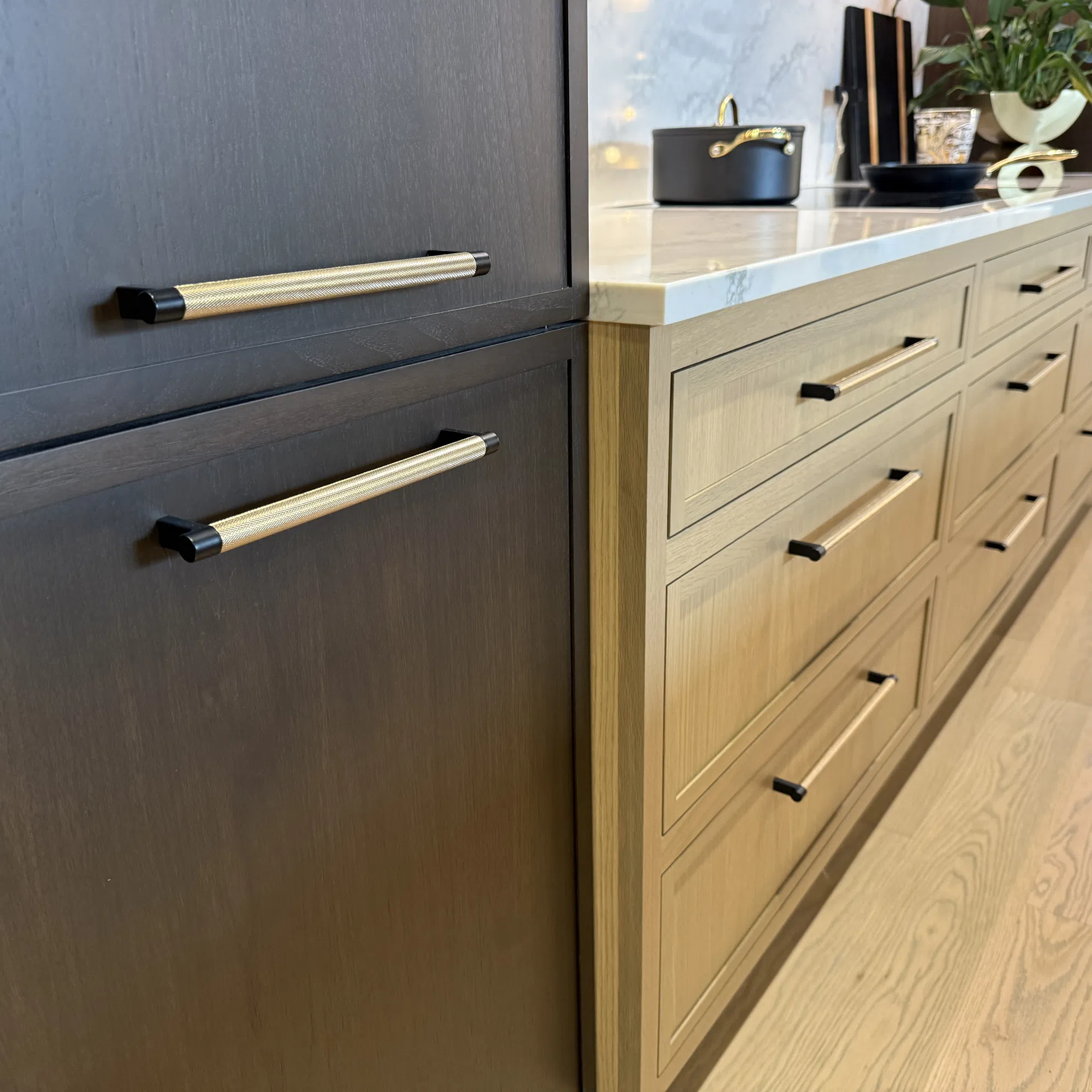 Two-tone kitchen cabinets with brass hardware