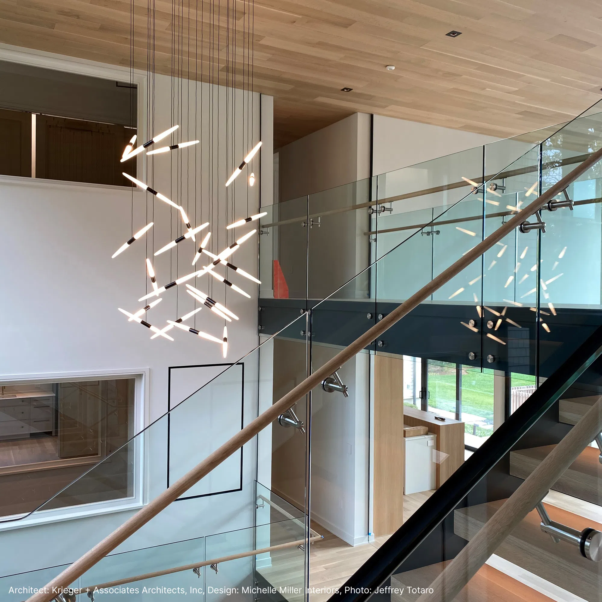 Contemporary pendant light over a staircase