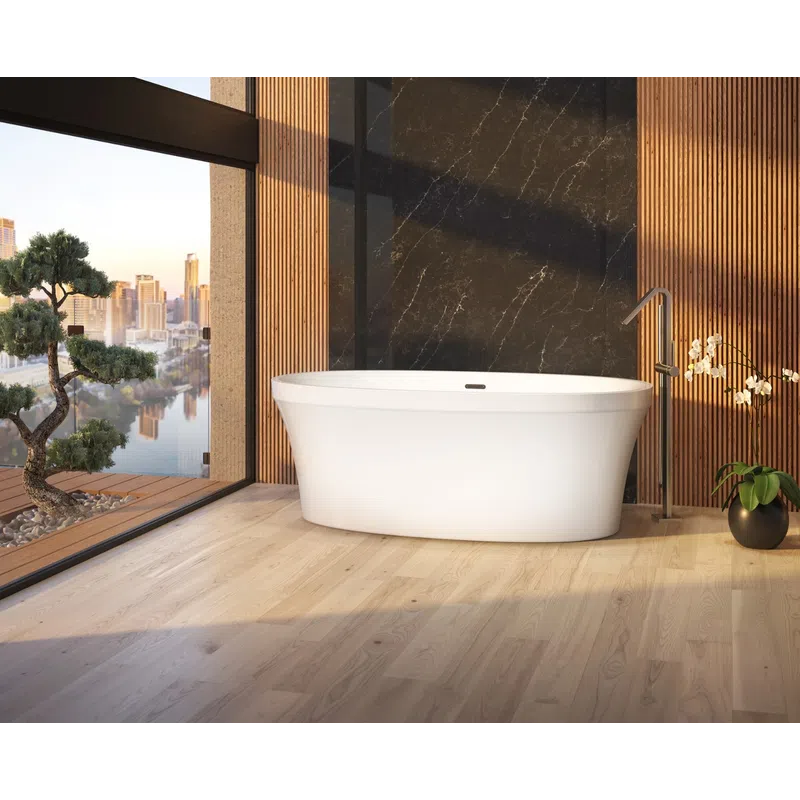 Modern freestanding bathtub in a wooden and stone bathroom with city skyline view through large glass windows.