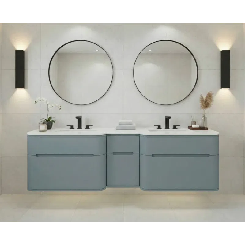 Modern bathroom with double vanity, round mirrors, black faucets, and minimalist blue cabinetry against white tiles.