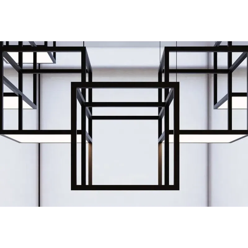 Modern black geometric cube pendant lights hanging against large white window blinds in minimalistic space.