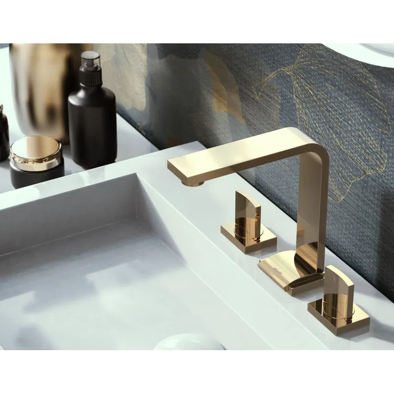 Modern bathroom sink with gold faucet, decorative vases, and dark floral wallpaper background