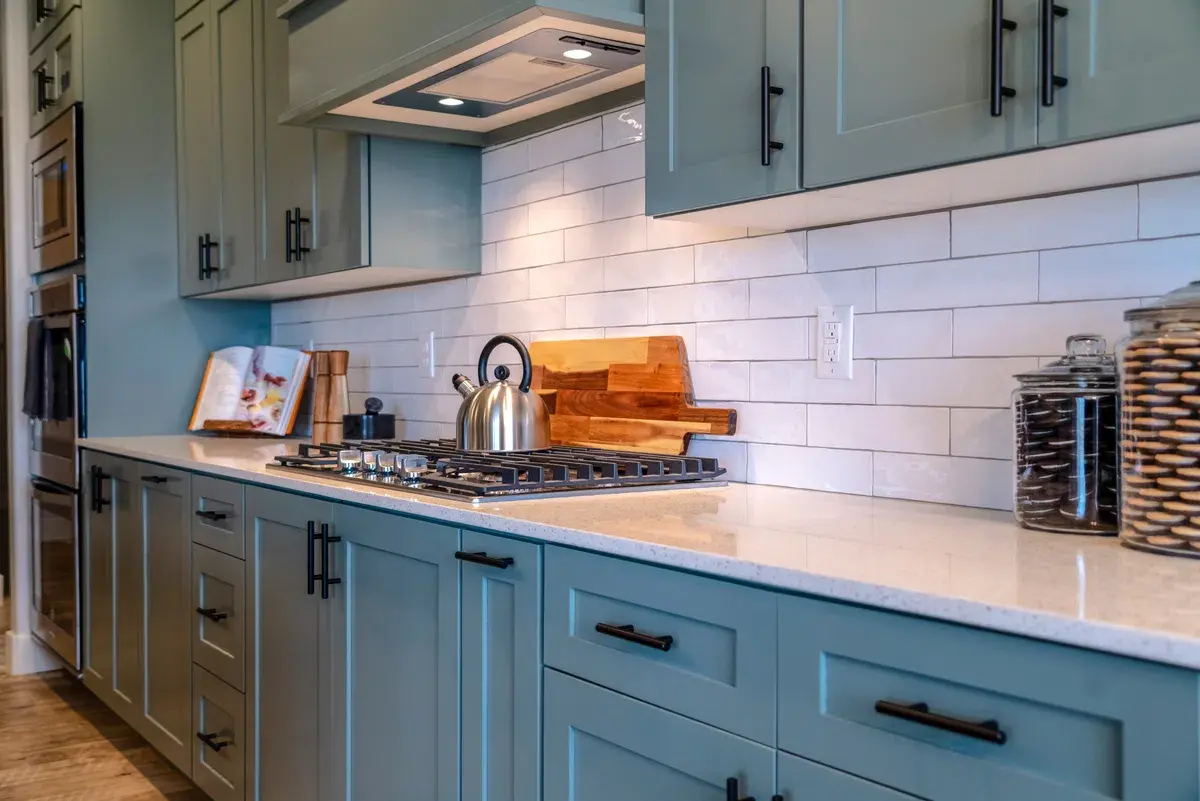 A kitchen with Wellborn cabinetry