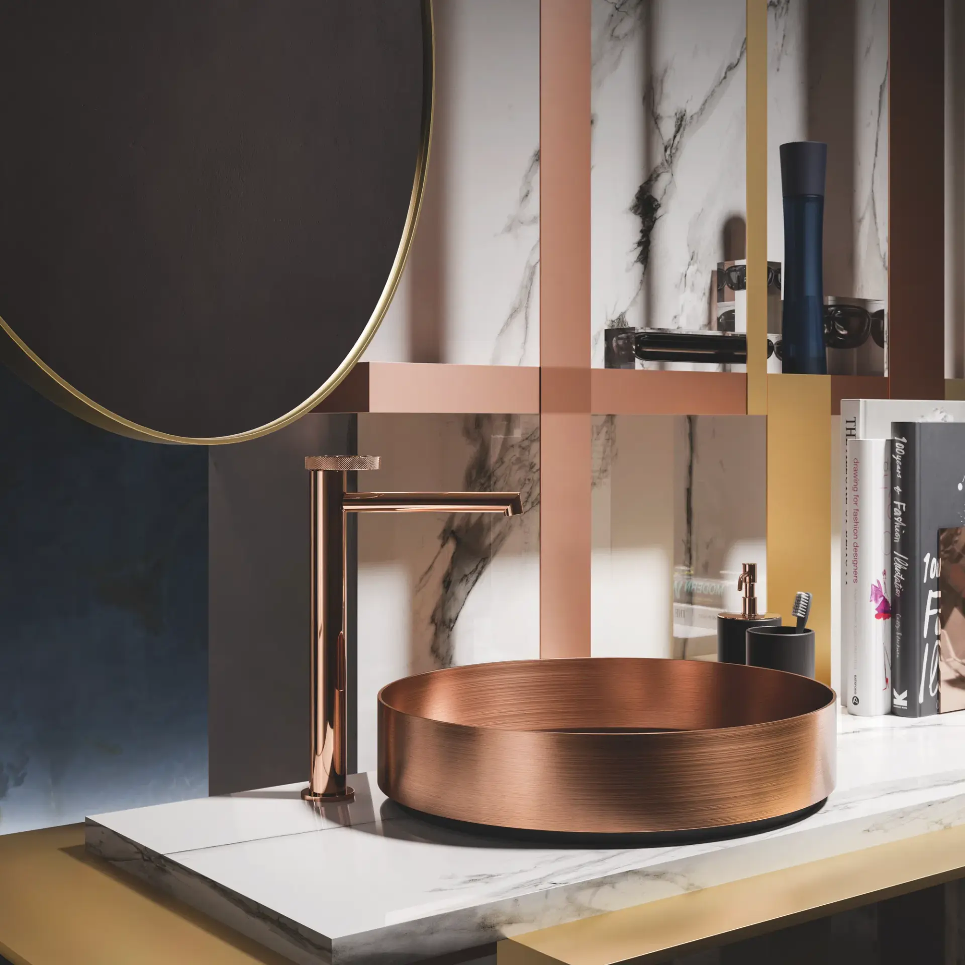 Copper vessel sink and faucet on a marble and brass Gessi vanity with a round mirror and styled shelving.