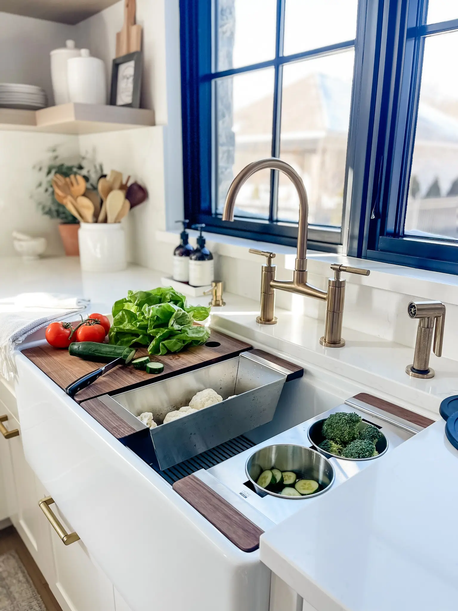 Julien Fira fireclay workstation sink installed in a modern kitchen.