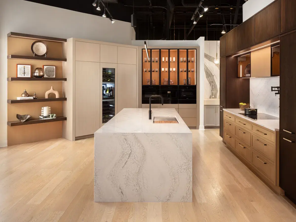 Contemporary kitchen design featuring an elegant marble island and stylish cabinetry.