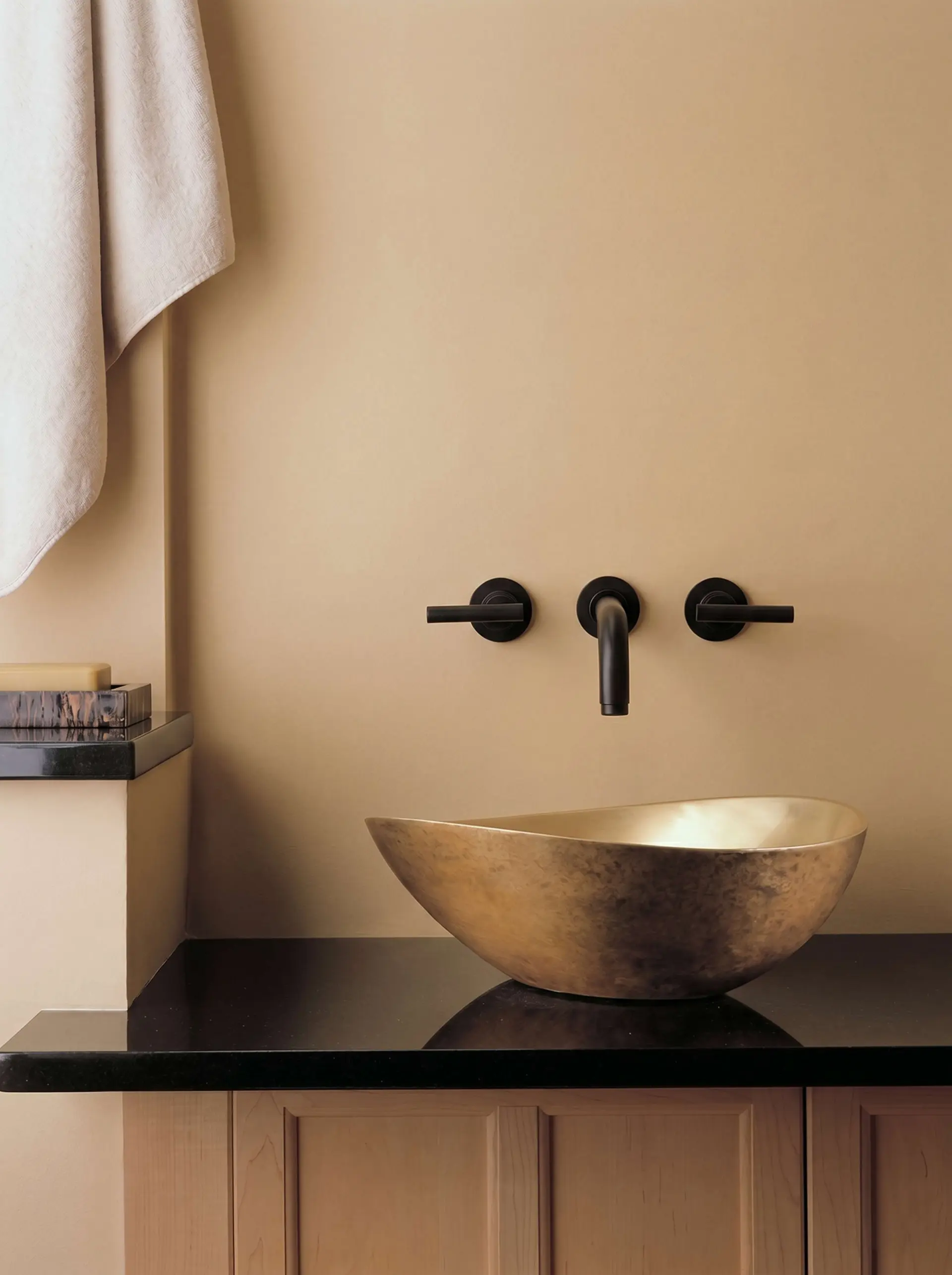 Stone Forest hand-carved stone bath sink and vanity.