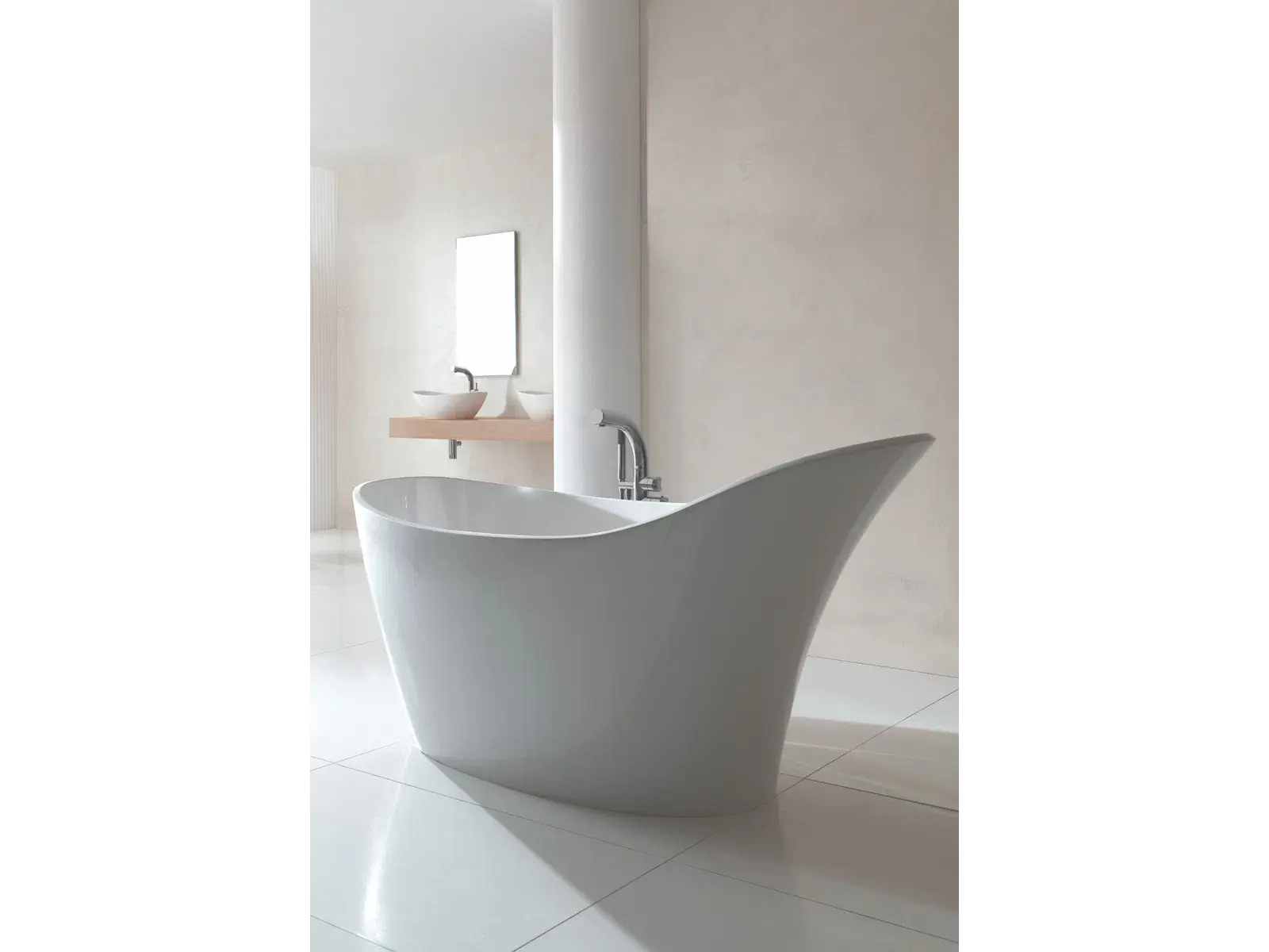 Modern white freestanding bathtub in a minimalist bathroom with sleek fixtures and wooden chair seating.