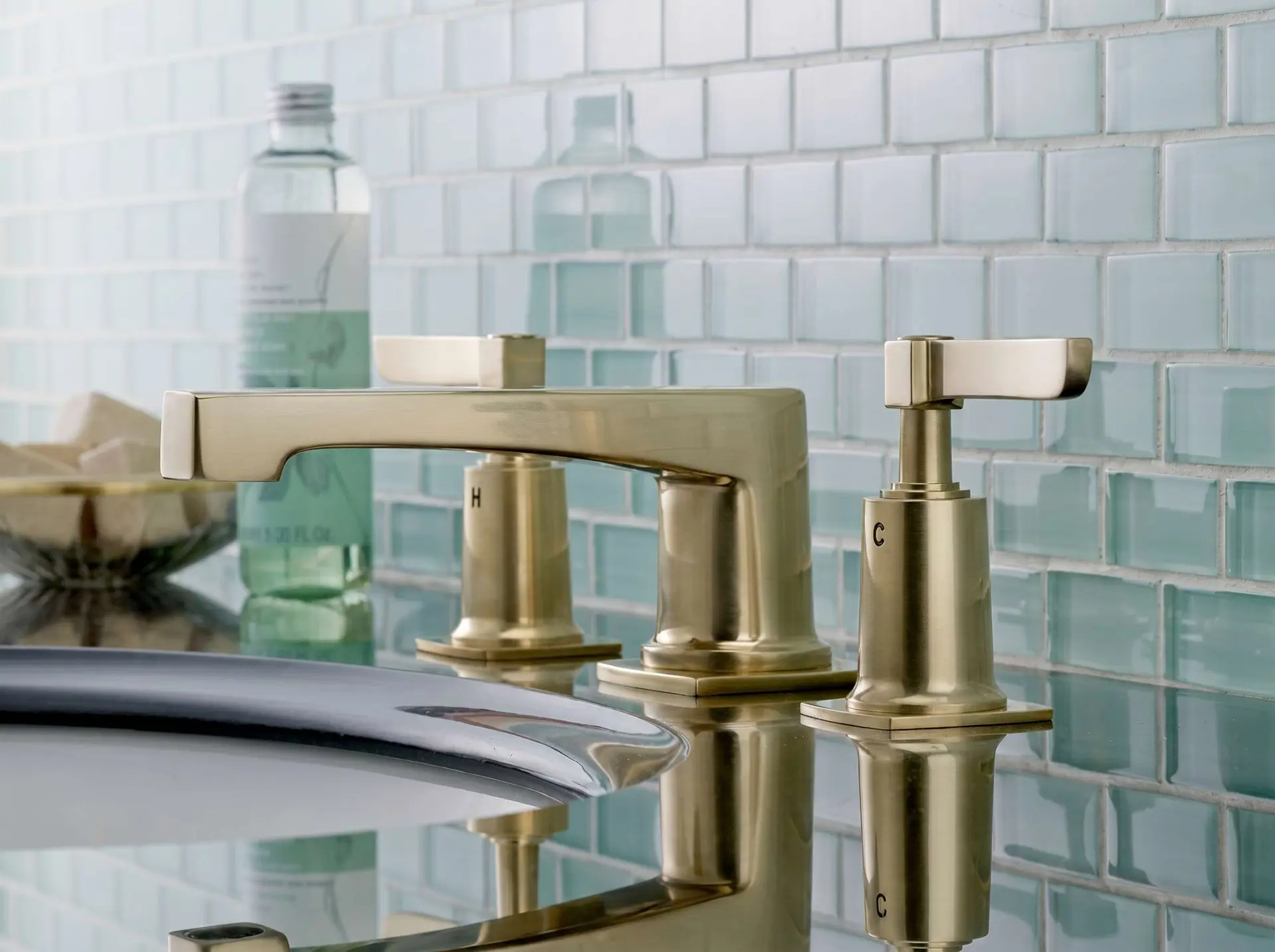 Watermark Designs faucet and fixture collection.